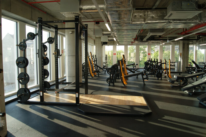 A squat and deadlift station at Just Gym Łódź Piotrkowska - a free weights zone with modern Matrix equipment.